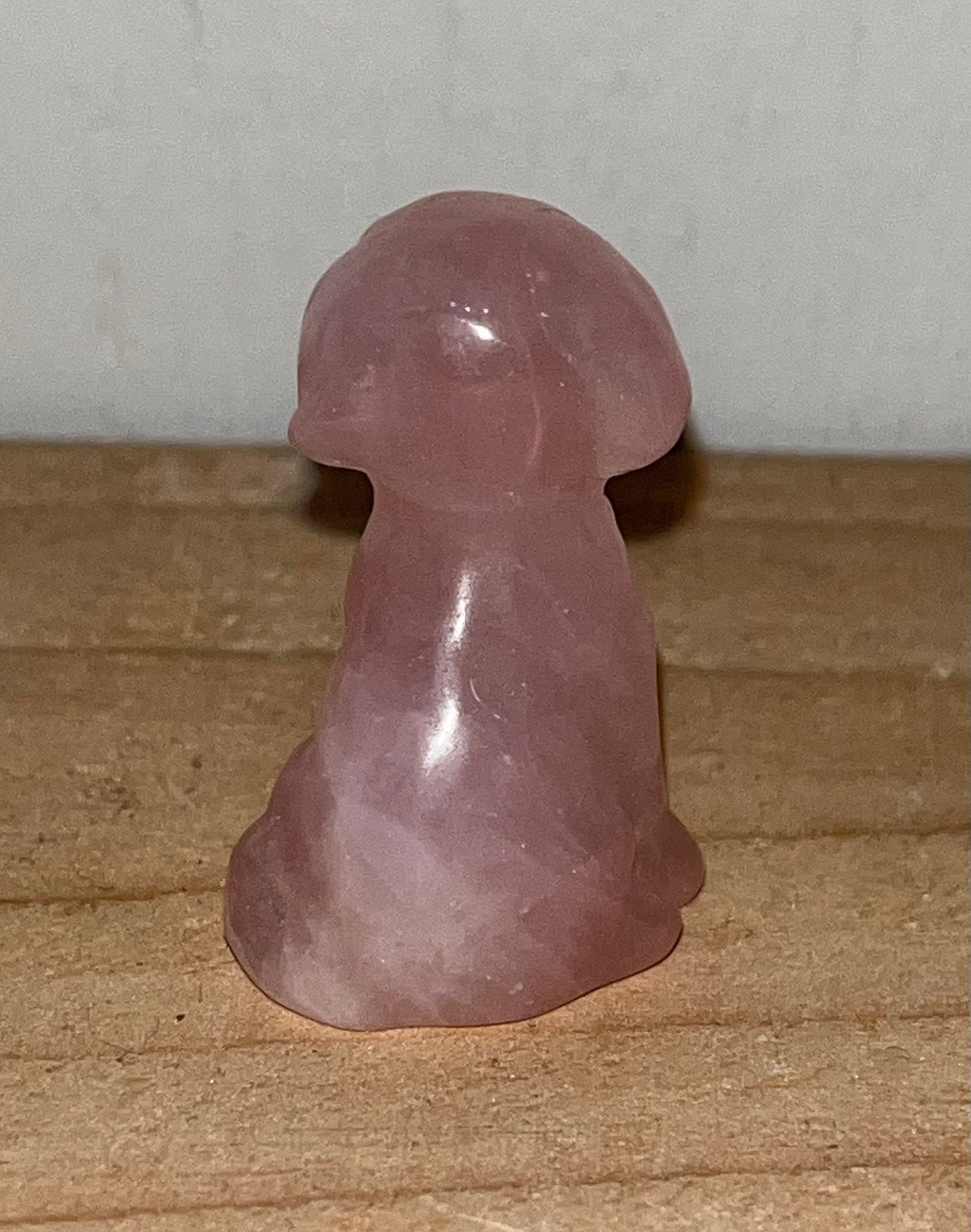 Rose quartz crystal dog carving