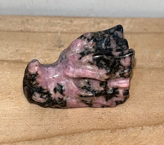 Pink Rhodonite crystal dragon head carving