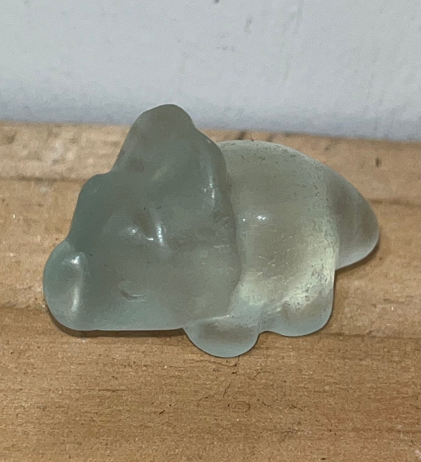 Green fluorite crystal dinosaur carving