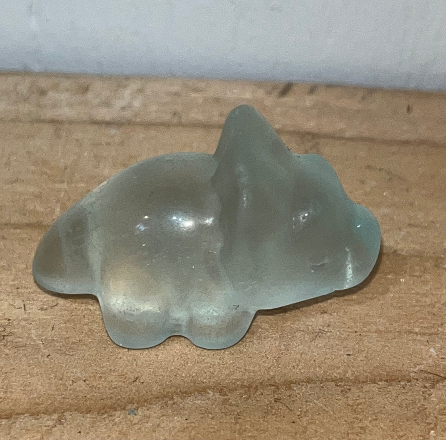 Green fluorite crystal dinosaur carving