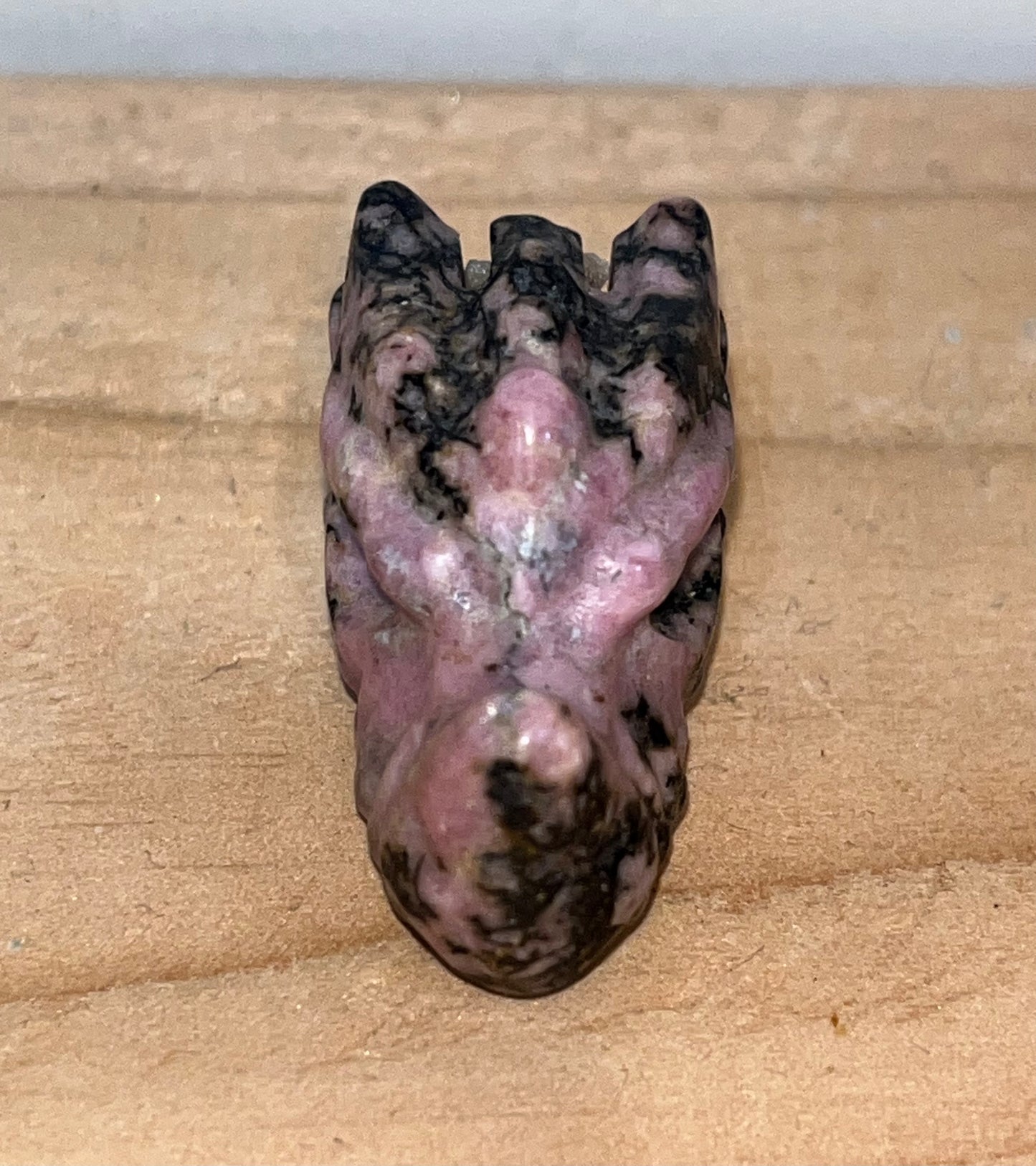 Pink Rhodonite crystal dragon head carving