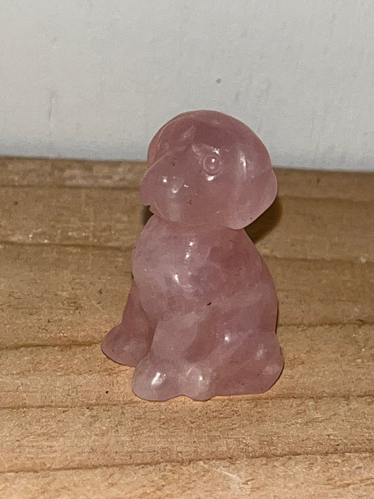 Rose quartz crystal dog carving