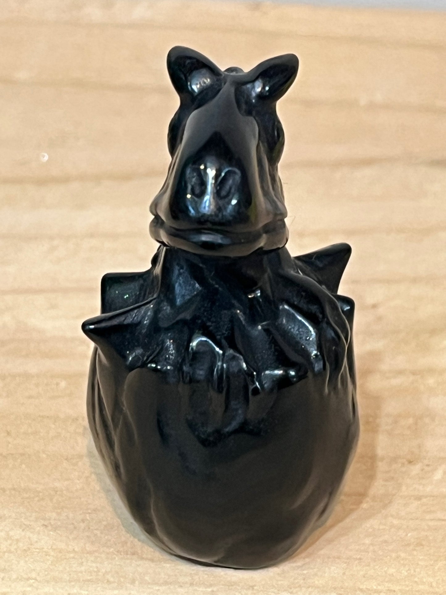 Obsidian crystal dino in egg