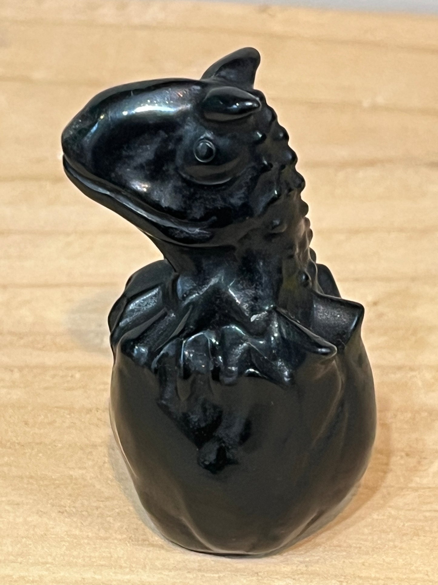 Obsidian crystal dino in egg